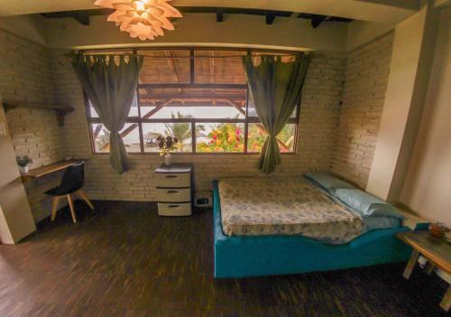 Llit o llits en una habitació de La Casa Hostel