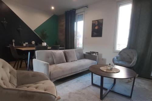 Χώρος καθιστικού στο Les Suite Appartement à Chalon sur Saône