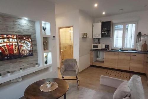 Η κουζίνα ή μικρή κουζίνα στο Les Suite Appartement à Chalon sur Saône