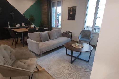 Χώρος καθιστικού στο Les Suite Appartement à Chalon sur Saône