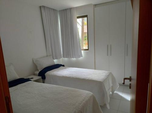 Voodi või voodid majutusasutuse Apartamento Iloa 07-H toas