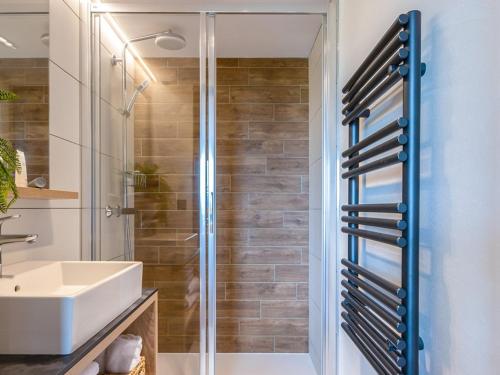 a bathroom with a shower and a sink at Appartement de standing 4 pièces, SPA, parking, Les Saisies - FR-1-810-10 in Les Saisies