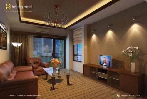a living room with a couch and a tv at Beijing Hotel Vinh - by BAY LUXURY in Ngô Xa