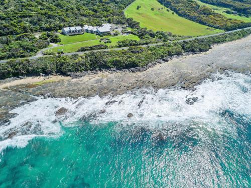 an aerial view of the ocean and a house at 12 Whitecrest Great Ocean Road Resort - Ocean Views in Wongarra