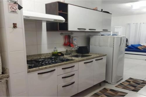 A cozinha ou cozinha compacta de Studio São Rafael
