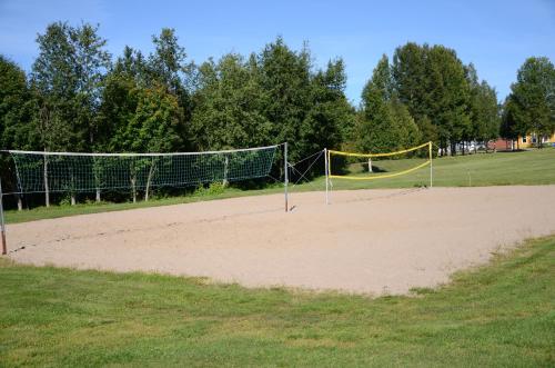 a volley ball court with a volleyball net at Storstrand Kursgård in Piteå