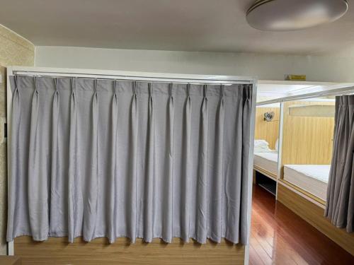 Postel nebo postele na pokoji v ubytování Opera Hostel