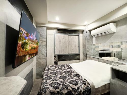Katil atau katil-katil dalam bilik di Hotel Rocks