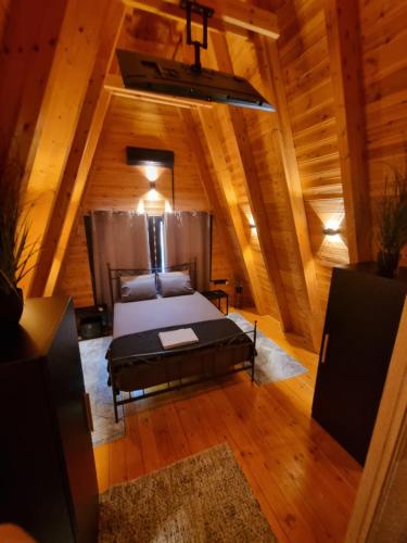 Postel nebo postele na pokoji v ubytování KOVU chalet