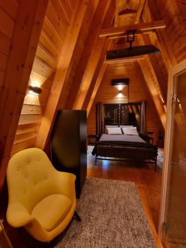 Postel nebo postele na pokoji v ubytování KOVU chalet