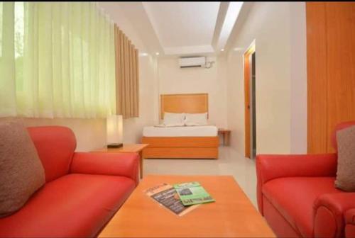 Χώρος καθιστικού στο Cherry's Courtyard Hotel