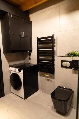 Kuchyň nebo kuchyňský kout v ubytování KOVU chalet