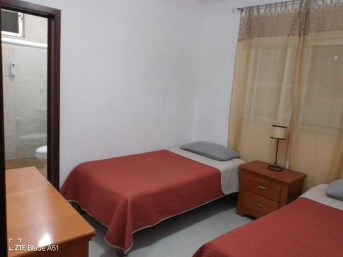 Postel nebo postele na pokoji v ubytování Villas con 2 albercas