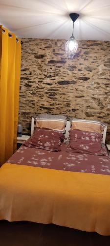 En eller flere senge i et værelse på Au cœur de Pornic