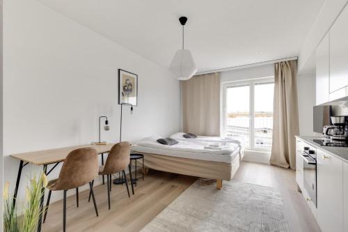 Η κουζίνα ή μικρή κουζίνα στο Kotimaailma Studio Apartments Pukkila