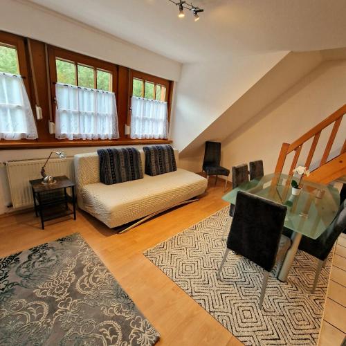 Ένα ή περισσότερα κρεβάτια σε δωμάτιο στο Maisonette-Suite Dörenkrug