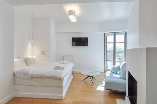 Posteľ alebo postele v izbe v ubytovaní Clock Tower Aparthotel