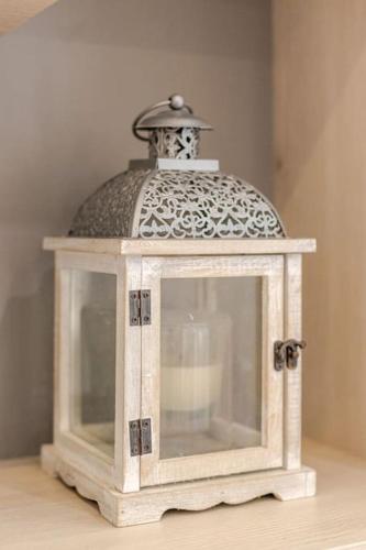 a small lantern sitting on top of a table at Apartment Bacvice in Split