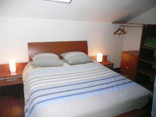 Chambres d'hôtes d'Antardieuにあるベッド