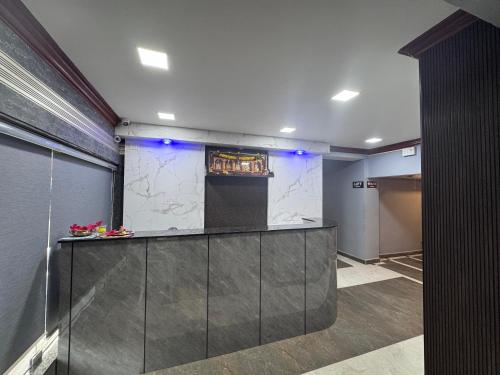 Kuchyň nebo kuchyňský kout v ubytování Sakthimurugan residency