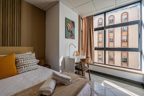 Posteľ alebo postele v izbe v ubytovaní Apartamento El Dorado cerca del mar