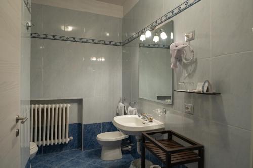 Koupelna v ubytování Hotel Romagna