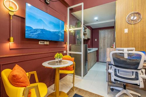 a dental room with a chair and a table at Primeworld District Condo - Near Mactan Airport in Lapu Lapu City