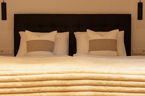 Una cama o camas en una habitación de Loft No. 78