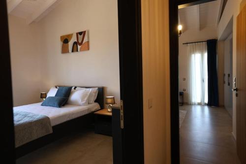 Ένα ή περισσότερα κρεβάτια σε δωμάτιο στο Sumelia Villa