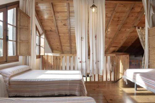 En eller flere senge i et værelse på Monte las viñas