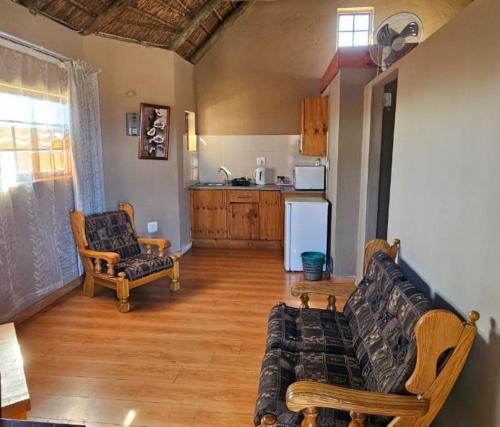Η κουζίνα ή μικρή κουζίνα στο Gaggle Inn Guest Lodge
