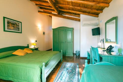Posteľ alebo postele v izbe v ubytovaní ALHAMBRA - Guest House di Charme
