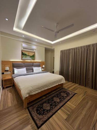 Cama o camas de una habitación en Heryk Hillview Hotel