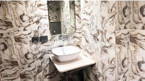 Ein Badezimmer in der Unterkunft as suite guest huseT2