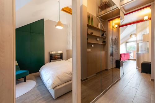 Ένα ή περισσότερα κρεβάτια σε δωμάτιο στο Moderný apartmán Swen s 2 terasami Tatranská Lomnica