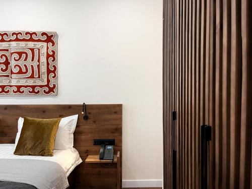 Cama o camas de una habitación en Akjola Hotel