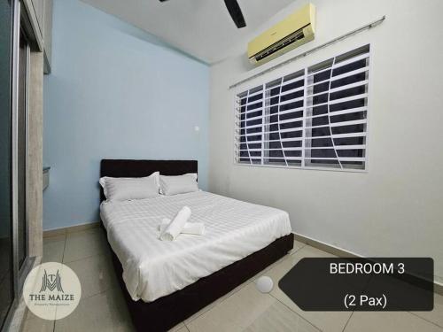 Ένα ή περισσότερα κρεβάτια σε δωμάτιο στο Cozy Nest - Sky Garden Residence Ipoh