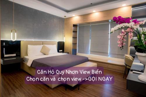 a hotel room with a bed and a window at FLC Sea Tower Quy Nhơn Apartment - Chillin Căn Hộ Hướng Biển in Quy Nhon
