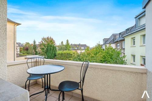 Balkón nebo terasa v ubytování Cozy 1BR with Balcony and Workspace in Hollerich