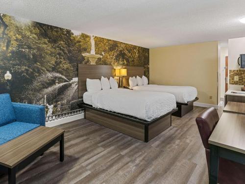 Un ou plusieurs lits dans un hébergement de l'établissement Clarion Pointe Savannah Gateway I-95