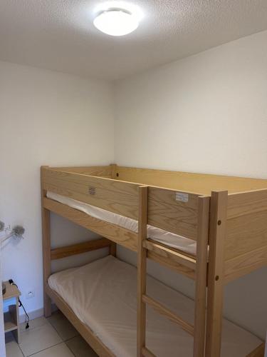 Palanda nebo palandy na pokoji v ubytování Studio 4 Couchages