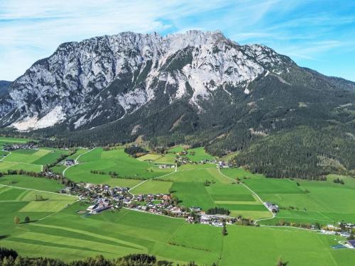 an aerial view of a village in front of a mountain at Holiday Home Katharina by Interhome in Gröbming