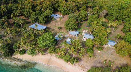 an aerial view of a house on a beach at Yawekata Eco Still Bluewater Lodge in Ngunu