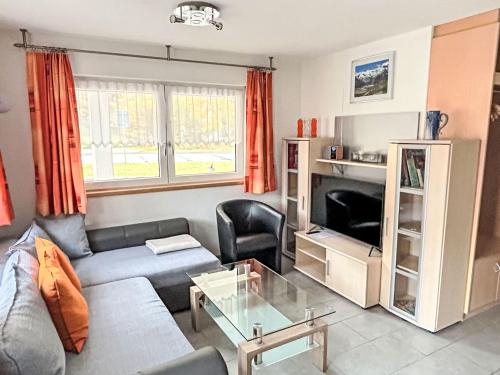 TV a/nebo společenská místnost v ubytování Apartment Alpenstern Aelpi by Interhome