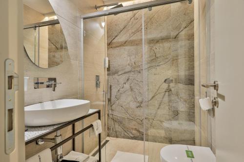 Koupelna v ubytování Hotel Botanica