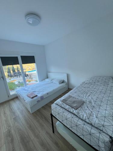 Ένα ή περισσότερα κρεβάτια σε δωμάτιο στο Pine Serenity Villa