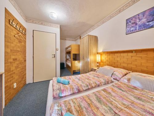 a hotel room with two beds in a room at Holiday Home Horní Lánov by Interhome in Horní Lánov