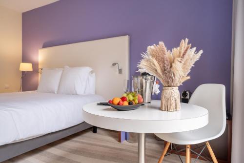 Postel nebo postele na pokoji v ubytování Mercure Antibes Sophia Antipolis