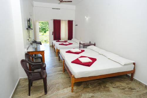 Cama o camas de una habitación en Green Valley Residency