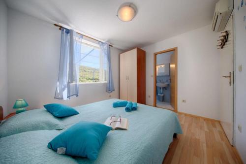 Postel nebo postele na pokoji v ubytování House Paradiso